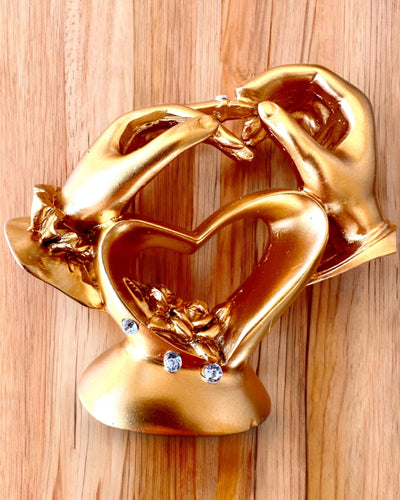 "Rakkauden kosketus" -figuuri, 10 cm korkea, kaiverrusmahdollisuus lahjaksi