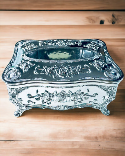 Tyylikäs nenäliinaboksi kohokuvioiduilla kukilla - lautasliinateline