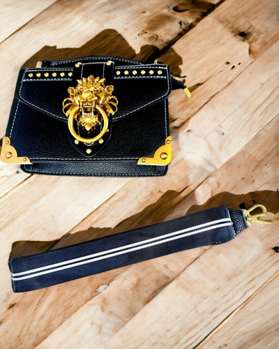 Muodikas Neliönmuotoinen Olkalaukku Leijona-aksentilla - väri musta